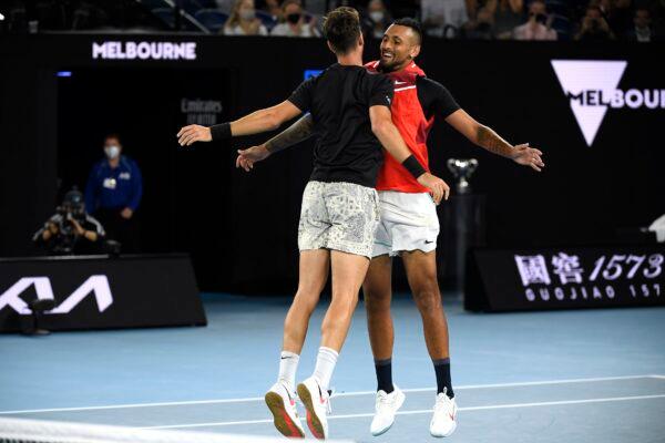 Nick Kyrgios (R) and Thanasi Kokkinakis of Australia celebrate after defeating compatriots Matthew Ebden and Max Purcell in the men's doubles final at the Australian Open tennis championships in Melbourne, Australia. on Jan. 29, 2022. (Andy Brownbill/AP Photo)