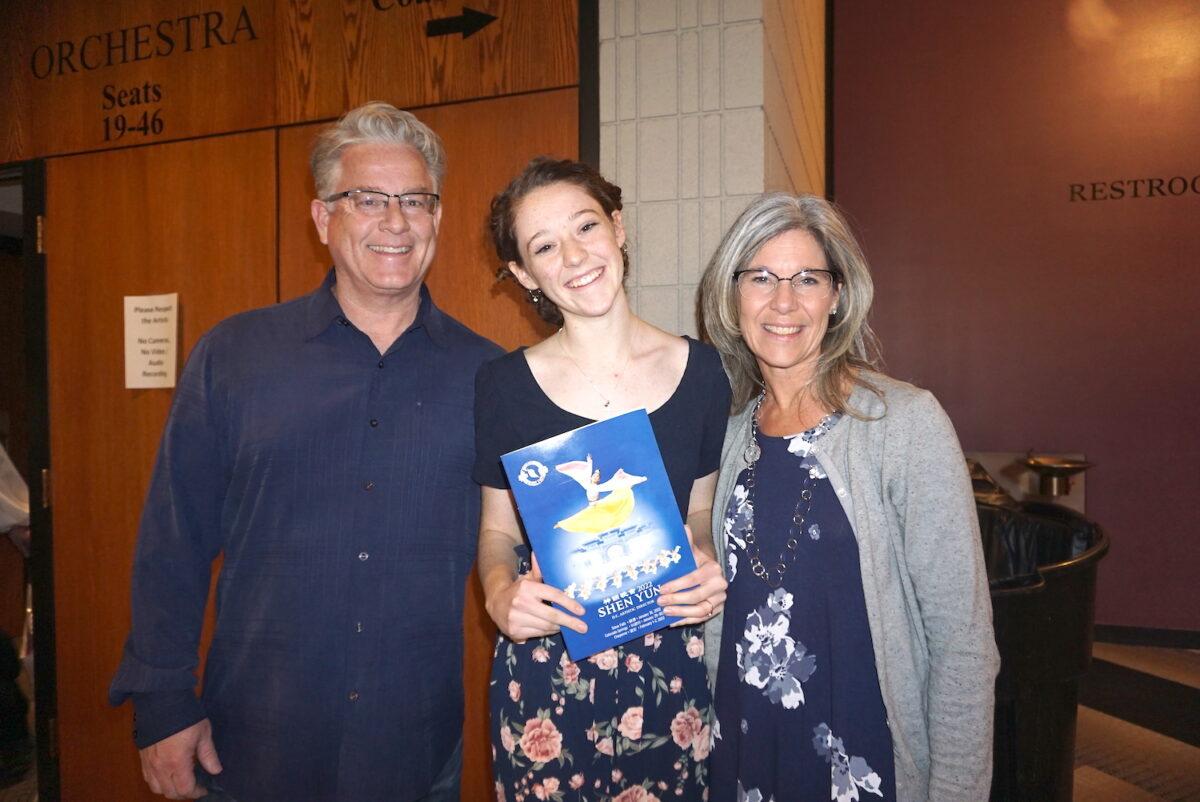 Bryan, Emma, and Jeanna Helgesen at the Shen Yun show in Colorado Springs on Jan. 30, 2022 (Sally Sun/Epoch Times)