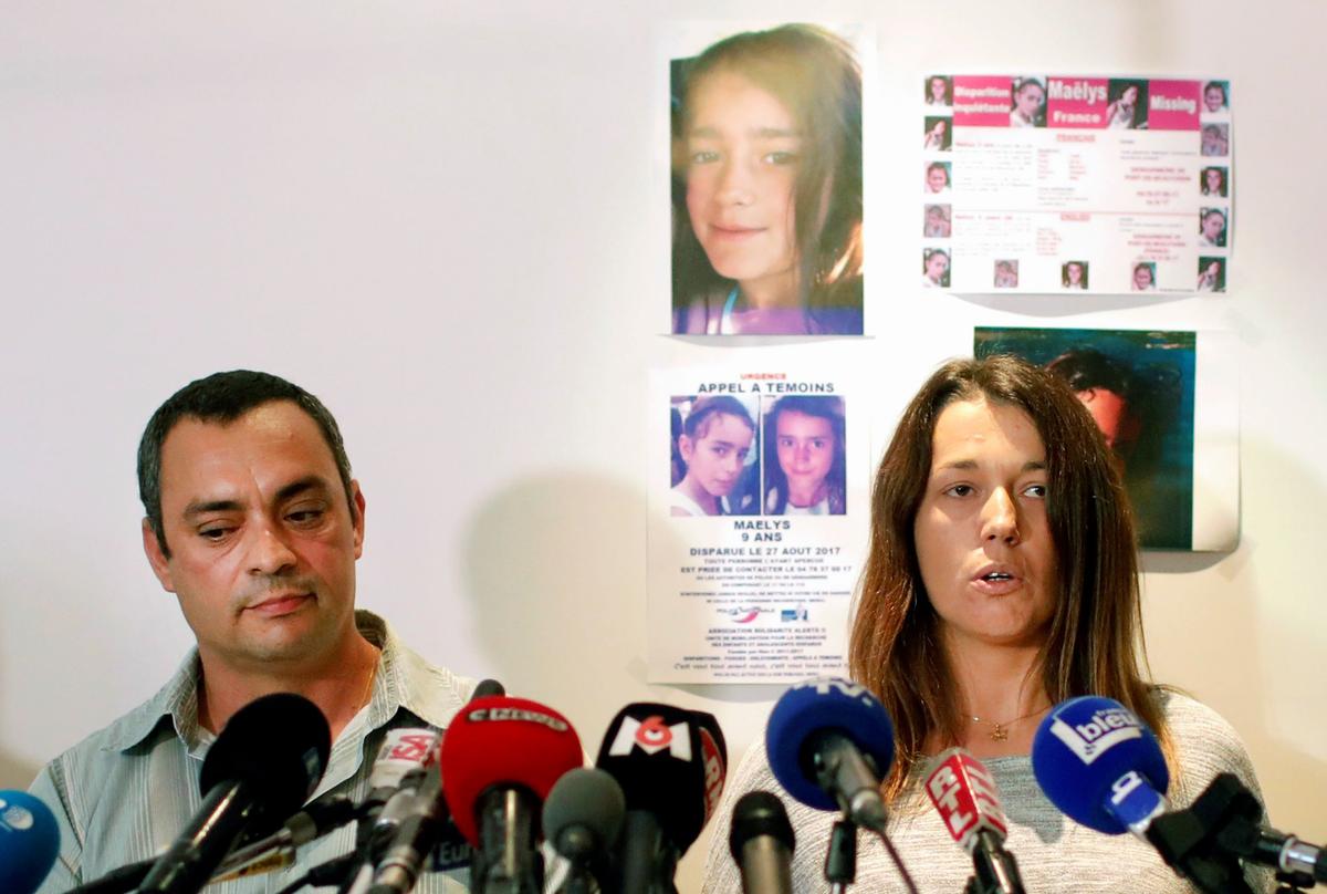 The father of killed girl, Maelys, Joachim de Araujo (L) and his wife, Jennifer, hold a press conference in Lyon, central France, on Sept. 28 2017. (Laurent Cipriani/AP Photo)