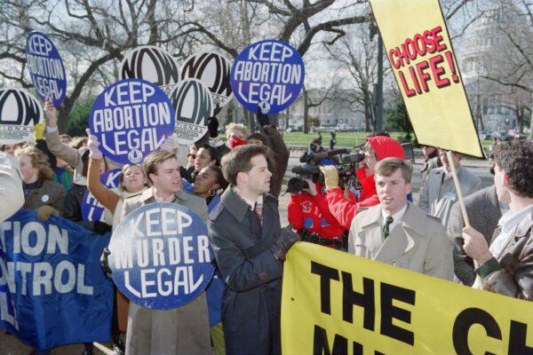 Small groups of demonstrators representing both sides of the abortion issue gathered in front of the Supreme Court in Washington on Nov. 29, 1989, as the justices heard arguments in two abortion cases. (Greg Gibson/AFP via Getty Images)