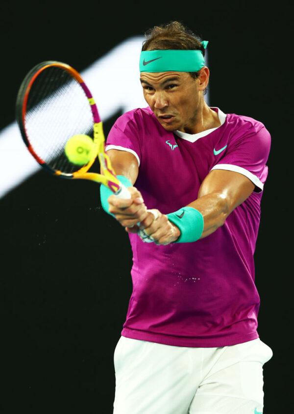 Rafael Nadal plays a backhand during his five set victory in his Men’s Singles Final match against Daniil Medvedev at the 2022 Australian Open at Melbourne Park in Melbourne, Australia on January 30, 2022 . (Photo by Clive Brunskill/Getty Images)