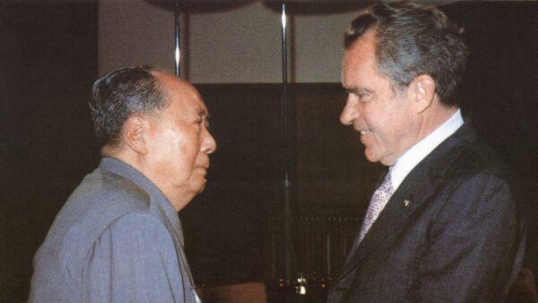 Chinese leader Mao Zedong (L) welcomes U.S. President Richard Nixon at his house in Beijing on Feb. 21, 1972. (AFP via Getty Images)