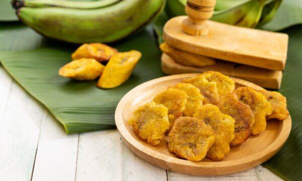 A typical Caribbean kitchen likely has a tostonera, used to flatten tostones into their medallion shapes, but you don't need one. (Engels Ozuna/shutterstock)