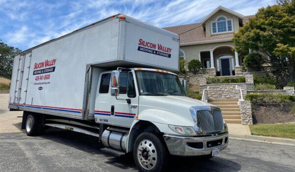 A truck from Silicon Valley Moving & Storage, based in San Jose, Calif., is parked outside a home, in an undated photo. (Courtesy of Joey Childs)