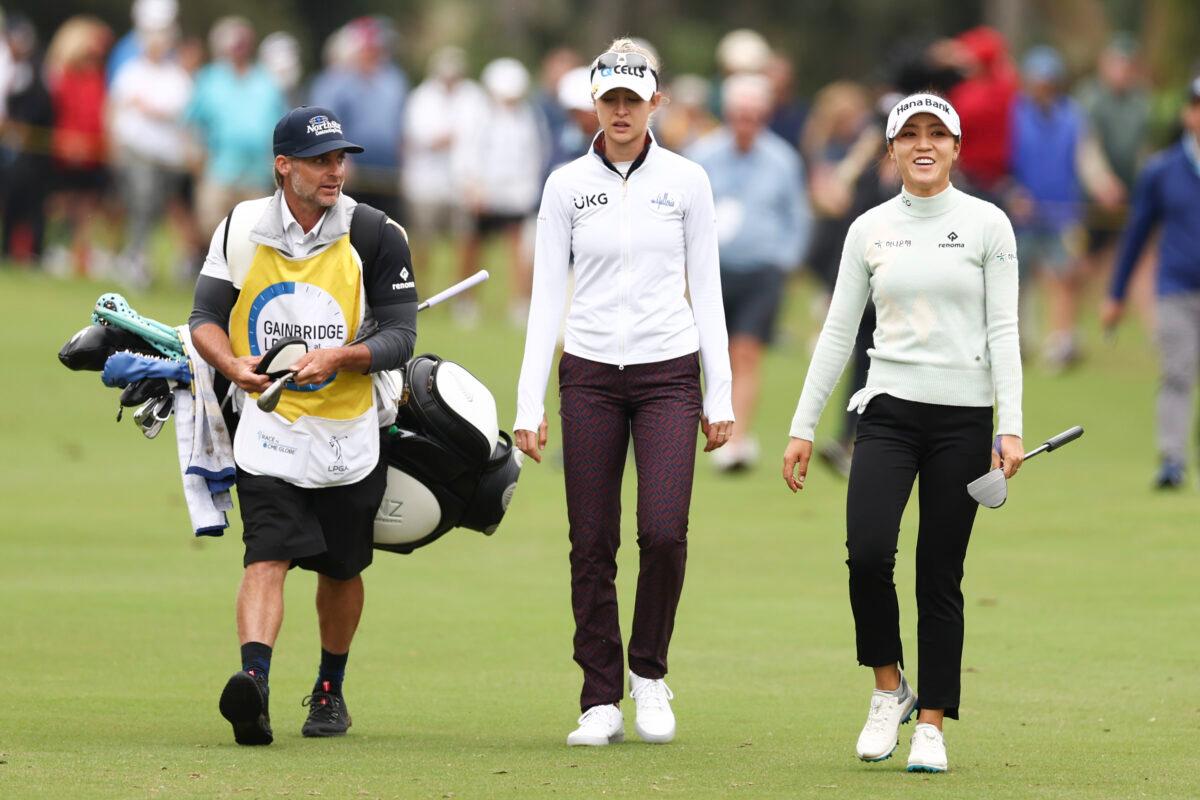 Lydia Ko of New Zealand and Nelly Korda walk on the 16th fairway during the second round of the 2022 Gainbridge LPGA at Boca Rio Golf Club, in Boca Raton, Fla., on Jan. 28, 2022. (Douglas P. DeFelice/Getty Images)