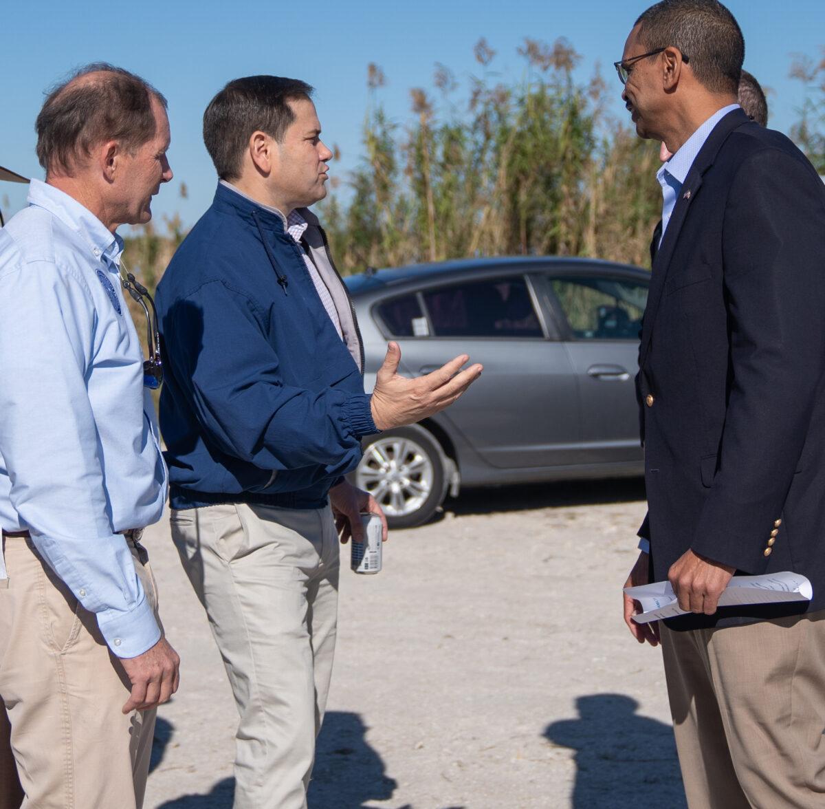 Two-term Republican incumbent U.S. Sen. Marco Rubio (R-Fla.), who is touting his 20 years of experience as an effective lawmaker in his November race against Democratic Rep. Val Demings (D-Fla.), speaks with Florida Department of Environmental Protection (DEP) Secretary Shawn Hamilton before a February 2022 press conference in the Everglades. (Courtesy of South Florida Water Management District)