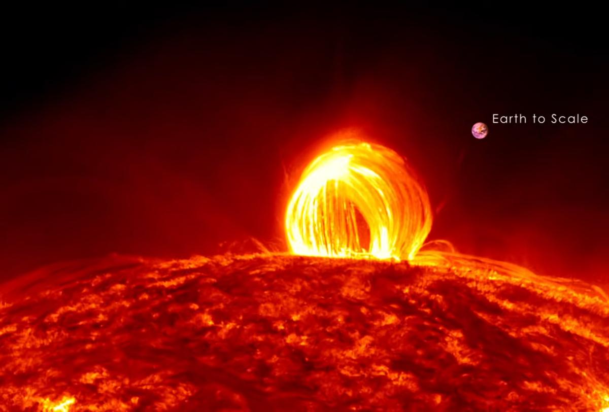 Screen capture taken of SDO footage titled "Fiery Looping Rain on the Sun," showing a solar eruption that occurred on July 19, 2012. (Courtesy of NASA/<a href="https://youtu.be/HFT7ATLQQx8">Goddard</a>)
