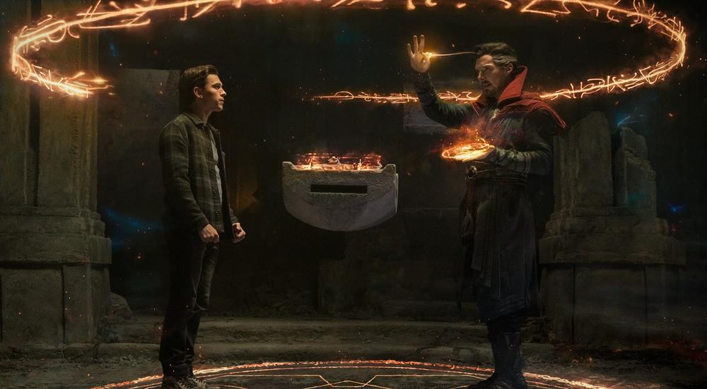 Peter Parker (Tom Holland) watches as Dr. Strange (Benedict Cumberbatch) opens a portal to another dimension, in "Spider-Man: No Way Home." (Marvel Studios/Columbia Pictures)