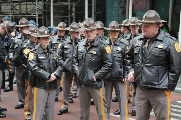 Troopers from New Castle County, Del., joined thousands of New York police officers on Feb. 2, 2022, to bid farewell to Wilbert Mora, who died after being shot on duty. (Richard Moore/The Epoch Times)