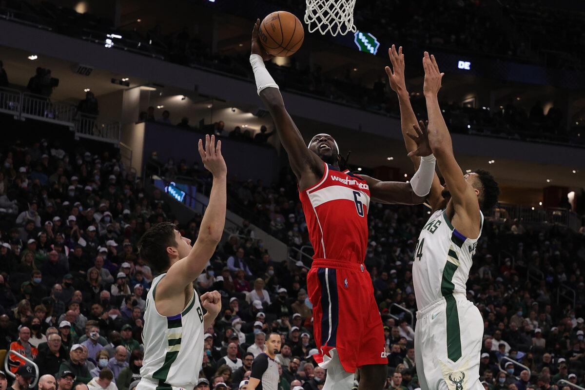 Montrezl Harrell #6 of the Washington Wizards drives to the basket against Giannis Antetokounmpo #34 of the Milwaukee Bucks during the second half of a game at Fiserv Forum, in Milwaukee, on Feb. 1, 2022. (Stacy Revere/Getty Images)