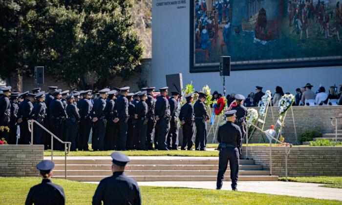 Off-Duty LAPD Officer Killed in Street Robbery Laid to Rest by Family, City Leaders