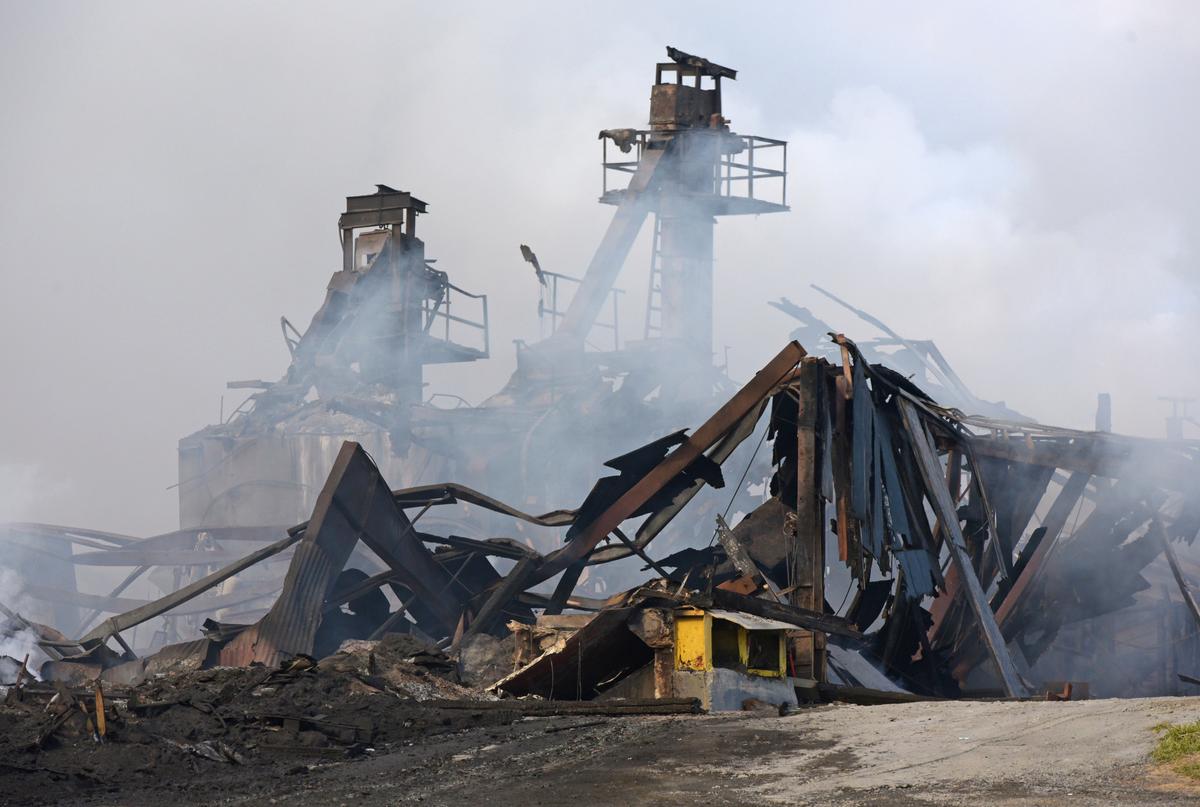 The Winston Weaver Co. fertilizer plant in Winston-Salem, N.C., continues to burn on Feb. 2, 2022. (Walt Unks/The Winston-Salem Journal via AP)