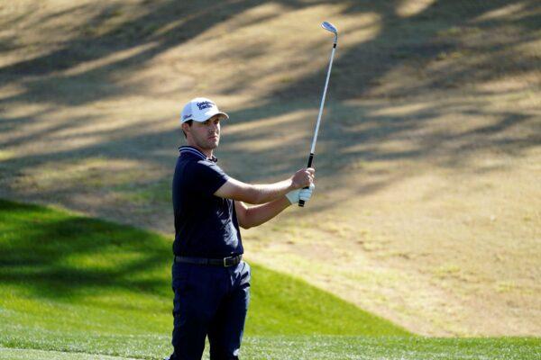 Patrick Cantlay watches his hit from the third fairway during the final round of the American Express golf tournament on the Pete Dye Stadium Course at PGA West in La Quinta, Calif on Jan. 23, 2022. (Marcio Jose Sanchez/AP Photo)