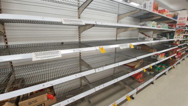 Empty shelves at a Coles in Yokine, Perth, Australia on Feb. 2, 2022. (The Epoch Times)