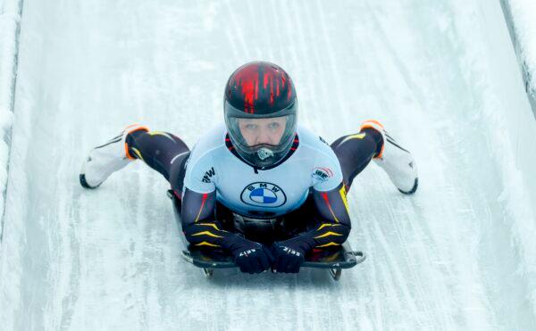 Belgium's Kim Meylemans reacts as she finishes the fourth run of the women's skeleton competition of the IBSF Skeleton World Championship in Altenberg, eastern Germany on Feb. 12, 2021. (Odd Andersen/AFP via Getty Images)