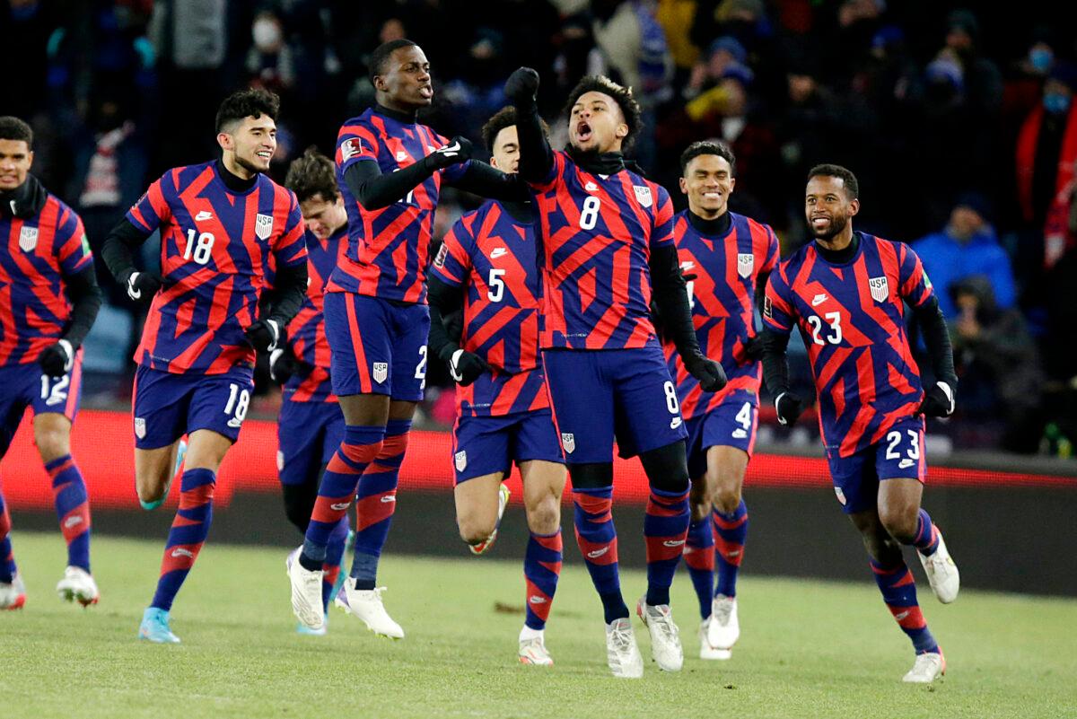 United States' Weston McKennie (8) celebrates a goal with teammates Kellyn Acosta (23), Reggie Cannon (4), Antonee Robinson (5), Tim Weah, (21) and Ricardo Pepi (18) during the first half of the team's FIFA World Cup qualifying soccer match against Honduras, in St. Paul, Minn., Feb. 2, 2022. (Andy Clayton-King/AP Photo)