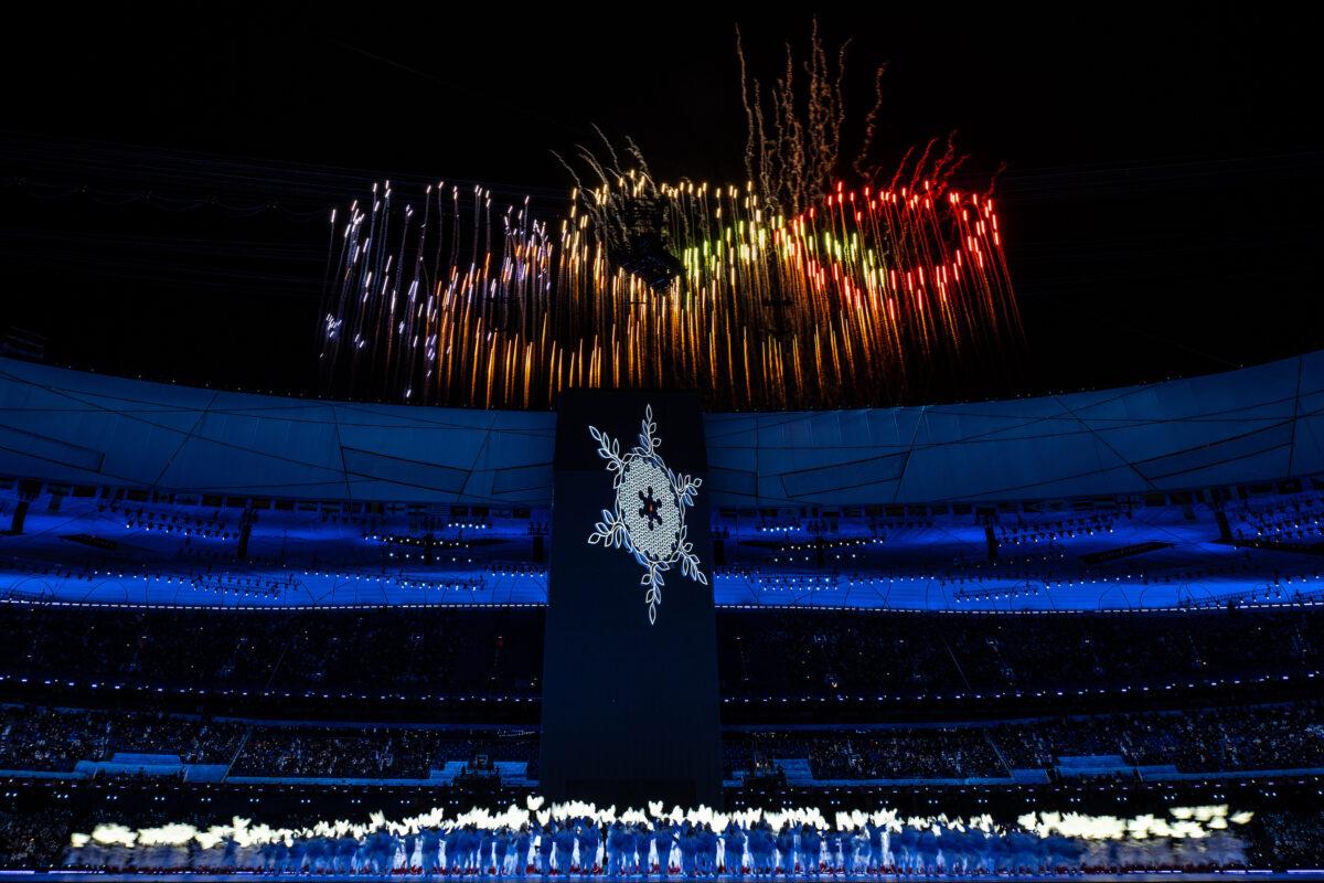 General view inside the stadium of the Olympic Cauldron as a firework display is seen above during the Opening Ceremony of the 2022 Winter Olympic Games at the Beijing National Stadium on Feb. 4, 2022. (David Ramos/Getty Images)