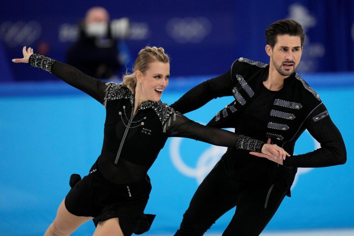 Madison Hubbell and Zachary Donohue of the United States compete during the ice dance team program in the figure skating competition at the 2022 Winter Olympics in Beijing on Feb. 4, 2022. (Bernat Armangue/AP Photo)