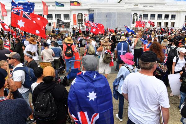 Protesters with flags are seen during an anti-vaccination rally outside Old Parliament House in Canberra, Australia, on Feb. 5, 2022. (AAP Image/Mick Tsikas)