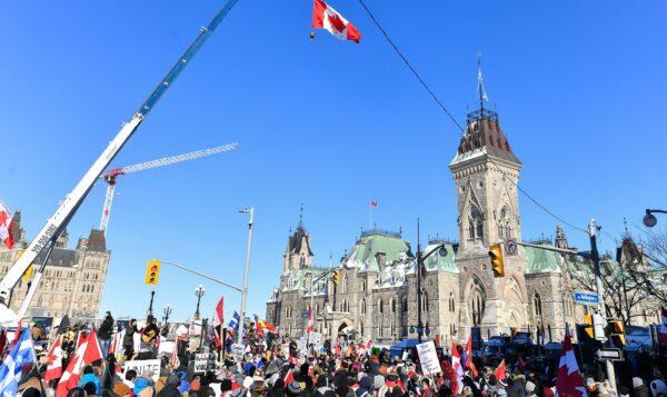 Thousands gather around Parliament Hill in support of the Freedom Convoy truck protest in Ottawa on Feb. 5, 2022. (Minas Panagiotakis/Getty Images)