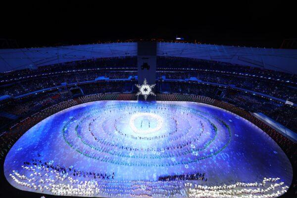 Performers surround the snowflake during the Opening Ceremony of the Beijing 2022 Winter Olympics at the Beijing National Stadium in Beijing, China on Feb. 04, 2022. (Richard Heathcote/Getty Images)