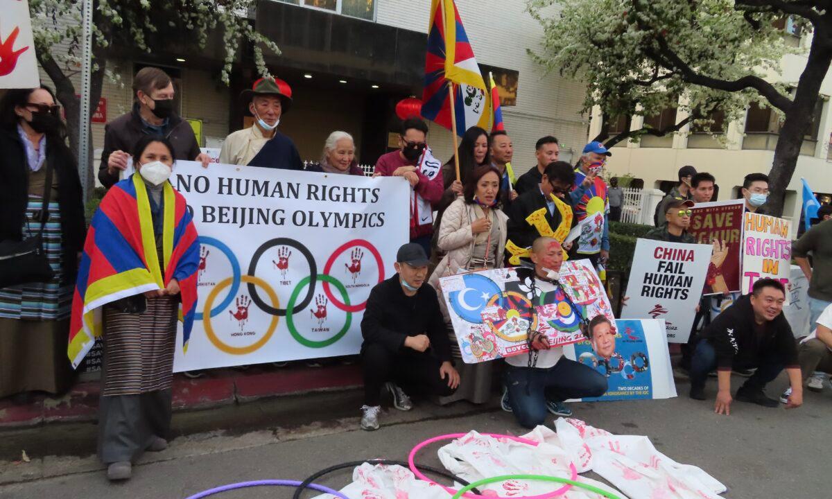 Dozens of human rights activists protested in front of the Chinese Consulate in Los Angeles, calling for boycotts of the 2022 Beijing Olympic Games, in California, on Feb. 3, 2022. (Alice Sun/The Epoch Times)