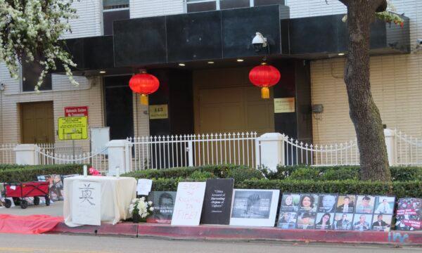Dozens of human rights activists protested in front of the Chinese Consulate in Los Angeles, displaying pictures of individuals persecuted by the Chinese regime and calling for boycotts of the 2022 Beijing Olympic Games on Feb. 3, 2022. (Alice Sun/The Epoch Times)