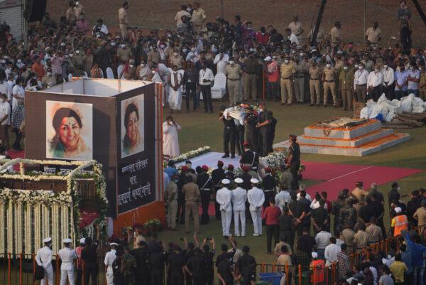 Defense forces carry the body of Lata Mangeshkar during funeral, in Mumbai, India, Feb.6, 2022. (Rafiq Maqbool/AP Photo)