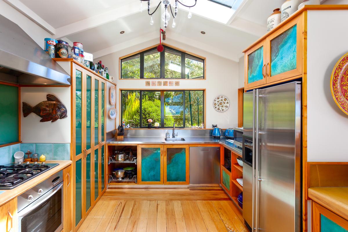 The kitchen displays the charming and unusual flair New Zealanders are famous for. The gourmet cooking space is, as it should be, the soul of this wonderful seafront residence. (New Zealand Sotheby’s International Realty)
