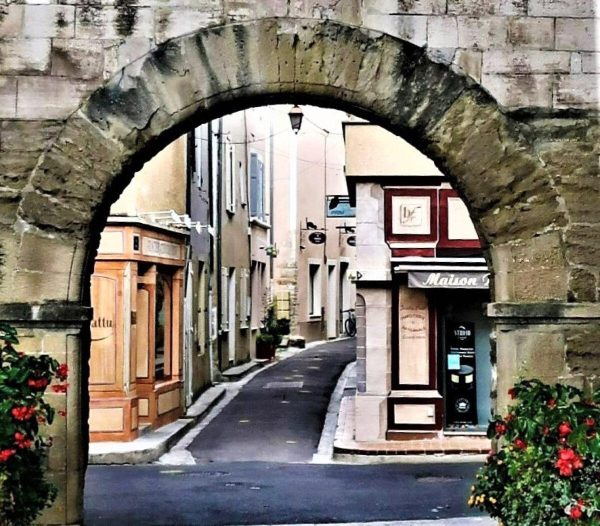 The village of Pernes-les-Fontaines, France, is entered through an arched gateway. (Victor Block)