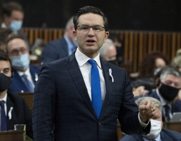 Conservative MP Pierre Poilievre rises during question period in the House of Commons on Dec. 6, 2021. (The Canadian Press/Adrian Wyld)