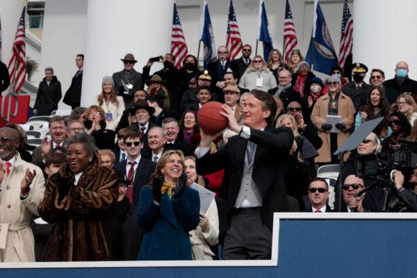 Virginia Gov. Glenn Youngkin holds a basketball thrown to him by the Norfolk Academy basketball team during the 74th Virginia inaugural ceremonies in Richmond, Va., on Jan. 15, 2022. (Anna Moneymaker/Getty Images)