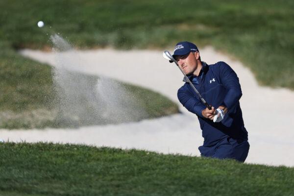 Jordan Spieth of the United States plays a shot from a bunker on the 17th hole during the final round of the AT&T Pebble Beach Pro-Am at Pebble Beach Golf Links, in Pebble Beach, Calif., on Feb. 6, 2022. (Jed Jacobsohn/Getty Images)
