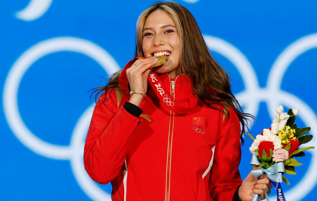 2022 Beijing Olympics - Victory Ceremony - Freestyle Skiing - Women's Freeski Big Air - Beijing Medals Plaza, Beijing, on Feb. 8, 2022. Gold medalist Gu Ailing Eileen of China celebrates on the podium. (Tyrone Siu/Reuters)