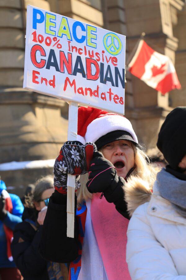 Protesters in Ottawa as demonstrations against COVID-19 mandates and restrictions continue, on Feb. 7, 2022. (Jonathan Ren/The Epoch Times)