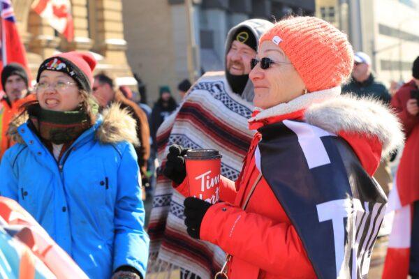 Protesters in Ottawa as demonstrations against COVID-19 mandates and restrictions continue, on Feb. 7, 2022. (Jonathan Ren/The Epoch Times)