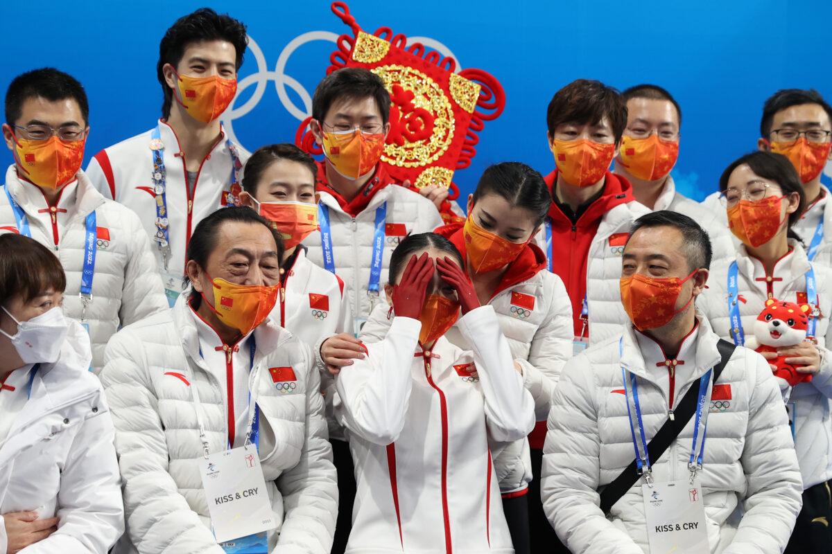 Zhu Yi  (C front) of Team China reacts to their score during the Women's Singles Free Skating Team event on day three of the Beijing 2022 Winter Olympic Games at Capital Indoor Stadium in Beijing on Feb. 7, 2022. (Catherine Ivill/Getty Images)
