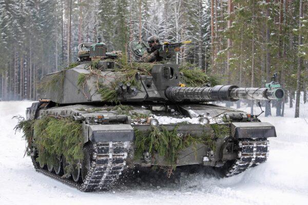 NATO battle groups from Estonia and the United Kingdom during military training at Central Training Area in Lasna, Estonia, on Feb. 8, 2022. (Paulius Peleckis/Getty Images)