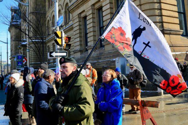 Protesters in Ottawa as demonstrations against COVID-19 mandates and restrictions continue, on Feb. 7, 2022. (Jonathan Ren/The Epoch Times)