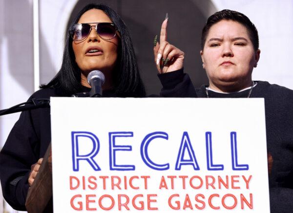 Desiree Andrade (L), whose 20-year-old son Julian Andrade was killed in 2018, speaks at a press conference with supporters of an effort to recall Los Angeles District Attorney Gascon in Los Angeles on Dec. 6, 2021. (Mario Tama/Getty Images)