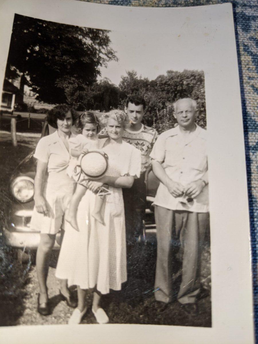 (From L to R) The author's mother, Alice; the author at age 2; Mildred Whitaker; her son, Ernie; and her husband, Ernest Whitaker in 1950. (Courtesy of Donna Rinehart)