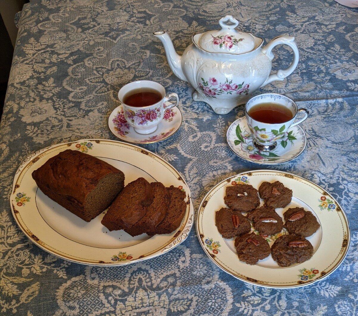 Gram's banana bread and molasses cookies, topped with pecans, with her teapot and teacups. (Courtesy of Donna Rinehart)