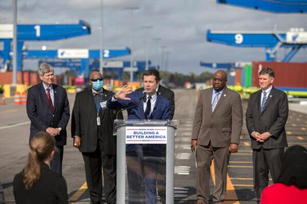 U.S. Transportation Secretary Pete Buttigieg in December 2021 discusses improvements planned by the Georgia Ports Authority in Savannah, Ga., that will be accelerated using federal allocations from the Infrastructure Investment and Jobs Act. (AP Photo/Stephen B. Morton)