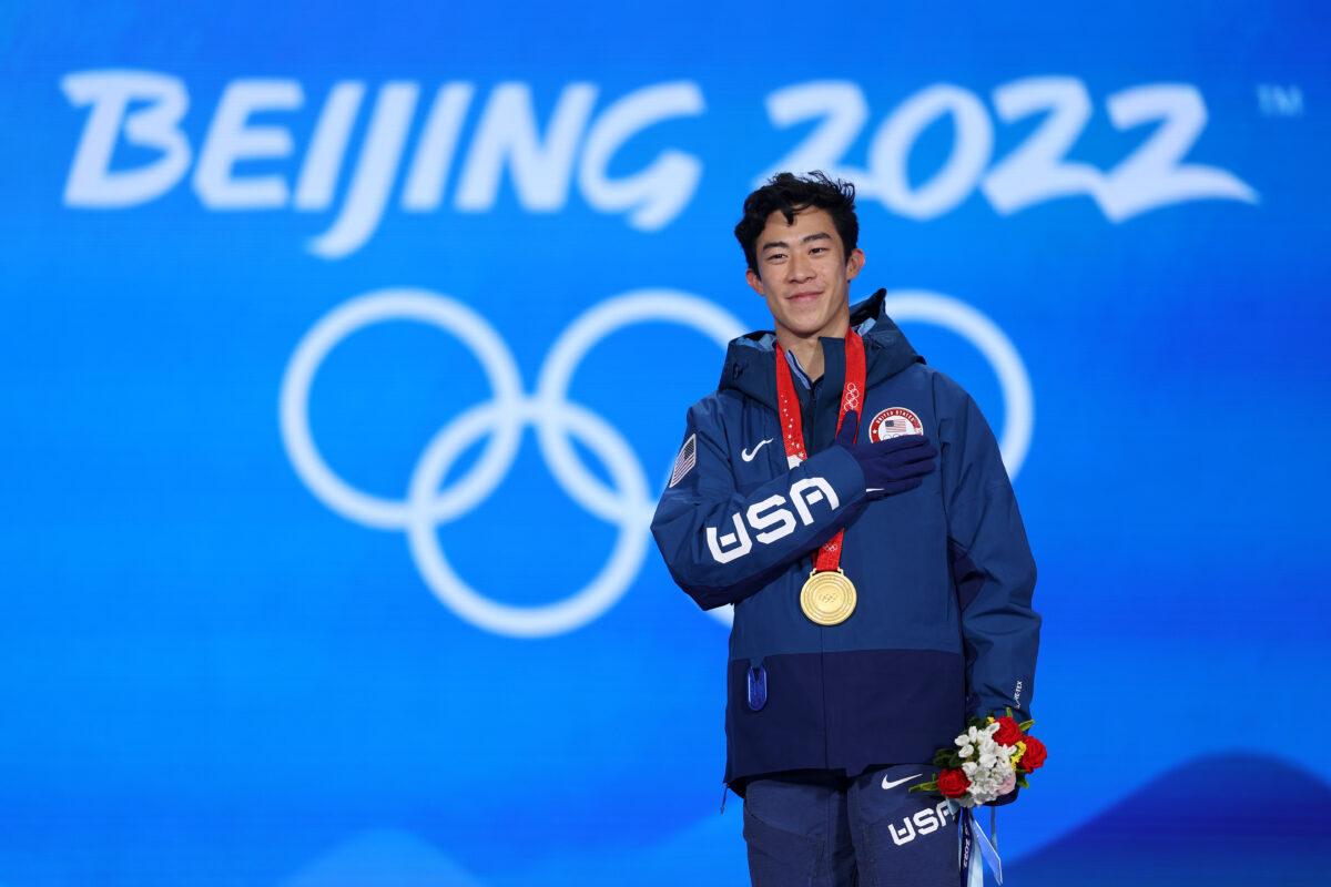 Gold medallist, Nathan Chen of Team USA, celebrates during the Figure Skating Men Single Skating medal ceremony on Day 6 of the Beijing 2022 Winter Olympic Games at Beijing Medal Plaza in Beijing, China, on Feb. 10, 2022. (Richard Heathcote/Getty Images)