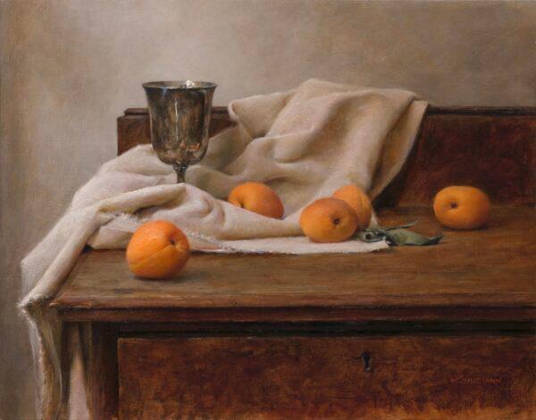 “Apricots With Silver Chalice,” 2020, by Kristen Valle Yann. Oil on panel; 11 inches by 14 inches. (Courtesy of Kristen Valle Yann)