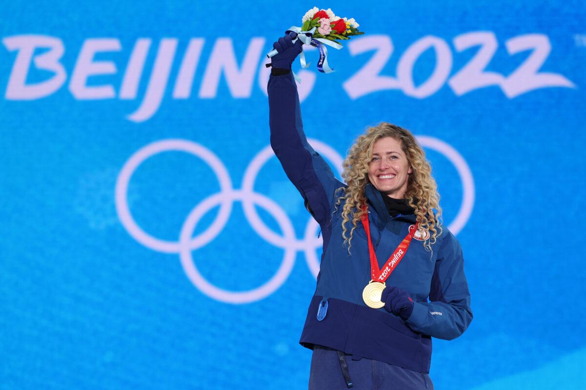 Gold medallist, Lindsey Jacobellis of Team USA, celebrates during the Women's Snowboard Cross medal ceremony on Day 5 of the Beijing 2022 Winter Olympic Games at Zhangjiakou Medal Plaza in Zhangjiakou, China, on Feb. 09, 2022. (Patrick Smith/Getty Images)