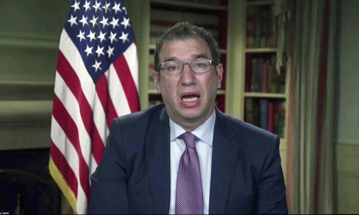 In this image from video, Andy Slavitt, senior adviser to the White House COVID-19 Response Team, speaks during a virtual briefing on Jan. 27, 2021. (White House via AP)