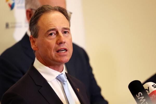 Minister for Health Greg Hunt speaks to media during a press conference at the Doherty Institute in Melbourne, Australia, on Dec. 14, 2021. (AAP Image/Con Chronis)