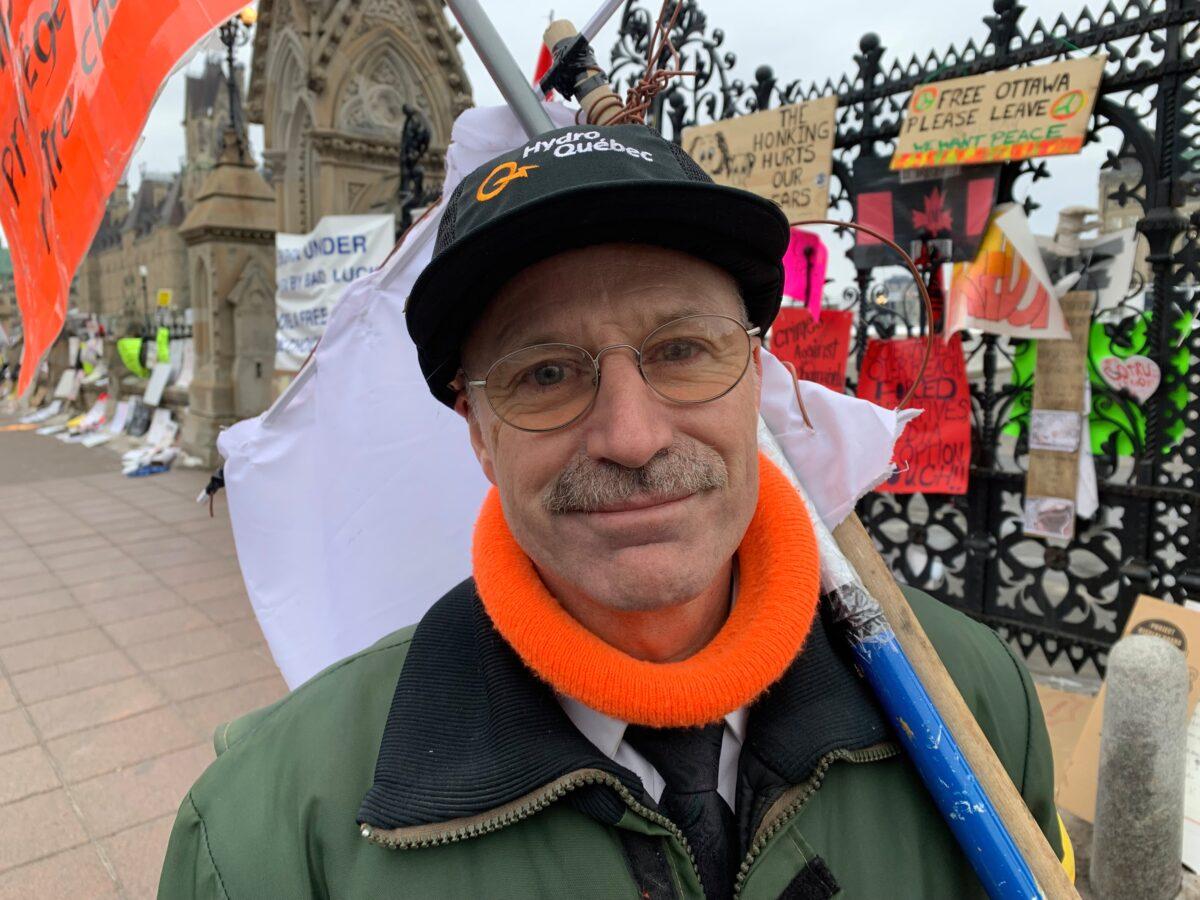 Armand Theriault has come from Quebec to support the truckers and patrols the protest area at night. (Richard Moore/The Epoch Times)