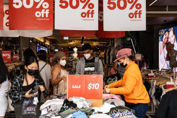 People browse apparel at Cotton On at Bourke Street store during the Boxing Day sales in Melbourne, Australia, on Dec. 26, 2021. (Diego Fedele/Getty Images)